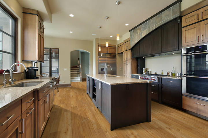 wood look floors in a large kitchen with multiple wood tones